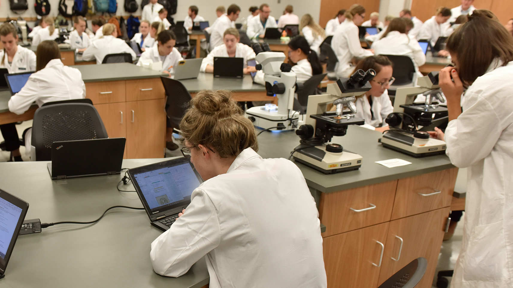 Veterinary students in pathology lab