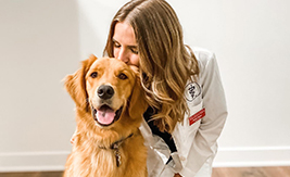 vet student kissing dog