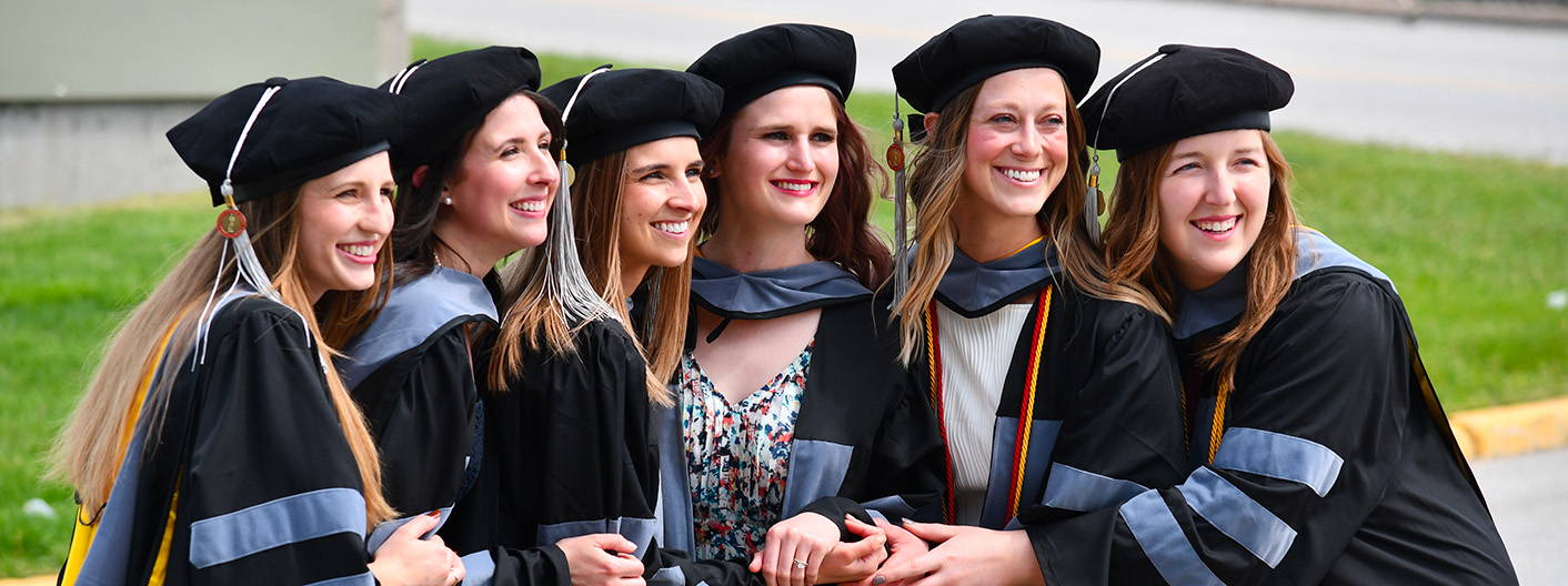 group of veterinary medicine graduates smiling