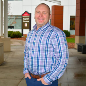 Dr. Chad Brown standing in front of Small Animal Hospital